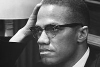 وفي عام 1964 أسس منظمة الوحدة الإفريقية الأمريكية، التي دافعت عن هوية السود وأكدت أن العنصرية، وليس البيض، هي المصيبة الأعظم التي تواجه الأمريكيين الأفارقة
